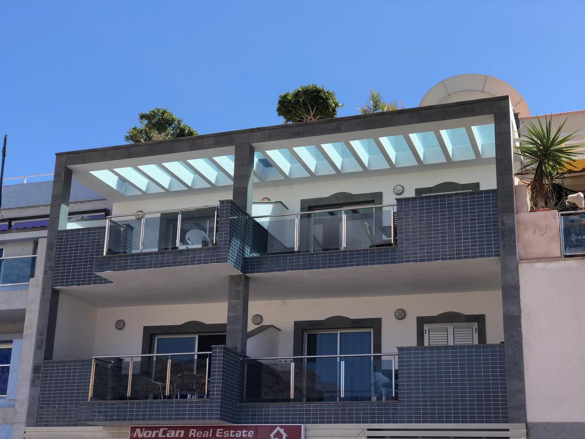 Billy'S Beachfront Apartment With Pool Access Puerto De Mogan Exteriör bild